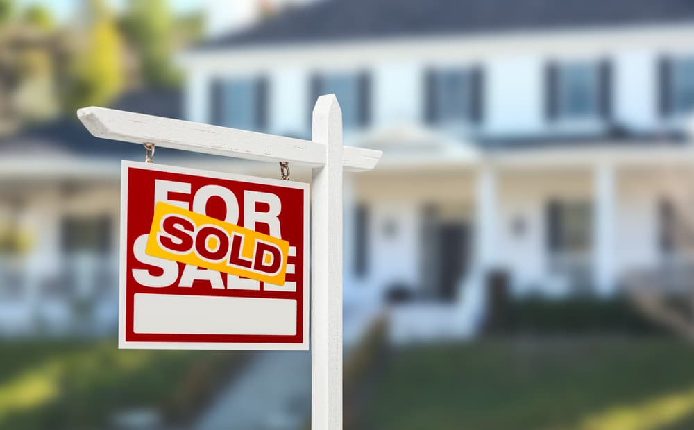 Sold sign in front of a home